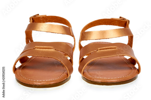 Golden color eco leather sandals isolated on white background