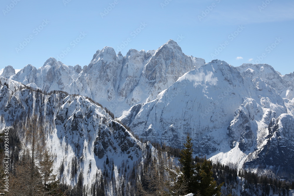 panorama of the snowy Italian Alps peaks in winter