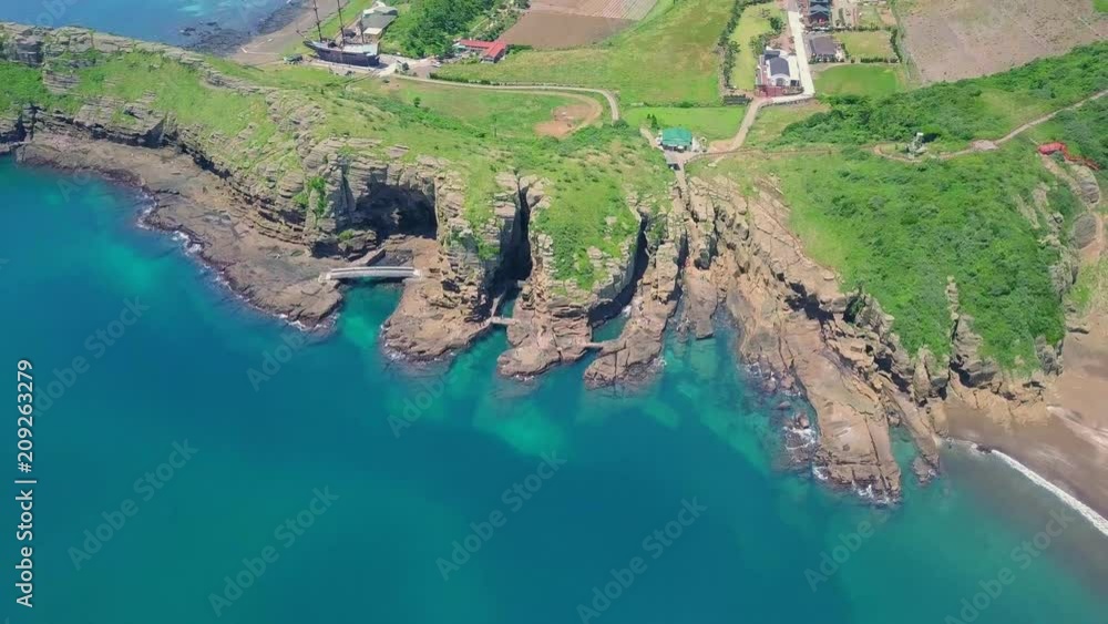 Aerial View of Yongmeori Coastal Walk on Jeju Island, South Korea. Rough Geological Formation Made with Erosion Aerial View of Yongmeori Coastal Walk on Jeju Island, South Korea. Rough Geological Formation Made with Erosion