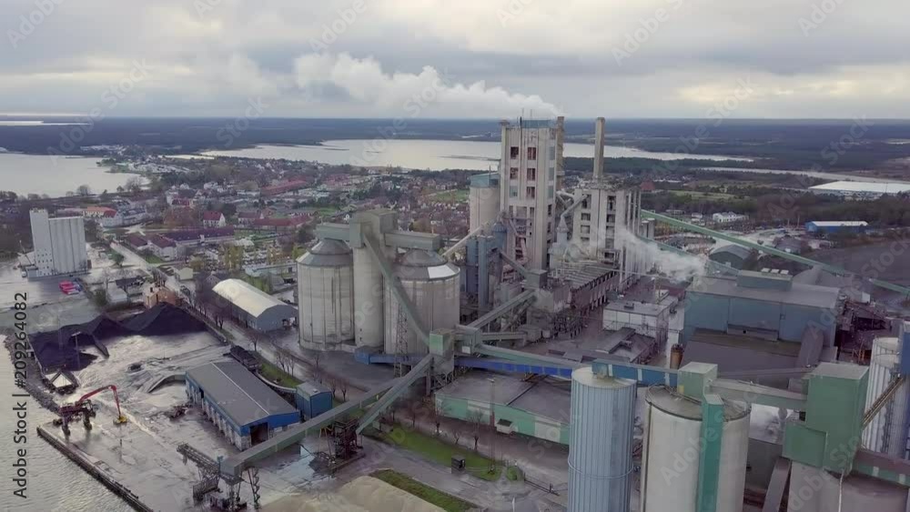 Aerial shot of cement factory building in Gotland, Sweden Aerial shot of cement factory building in Gotland, Sweden