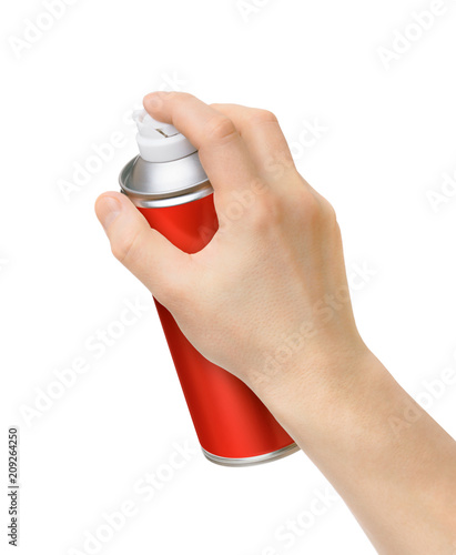 spray can in the male hand on white background photo