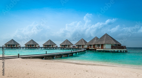 Fototapeta Naklejka Na Ścianę i Meble -  Maldives beautiful beach background white sandy tropical paradise island with blue sky sea water ocean