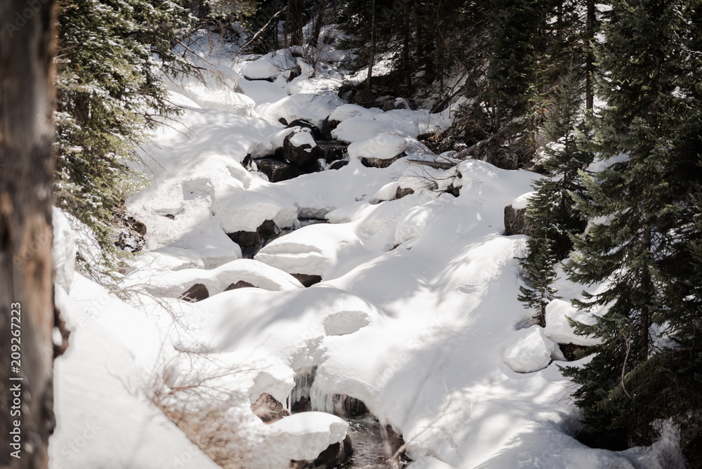 A snow covered river near Vail, Colorado. A snow covered river near Vail, Colorado.