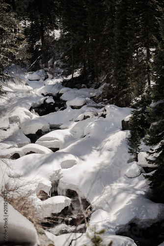 A snow covered river near Vail, Colorado. 