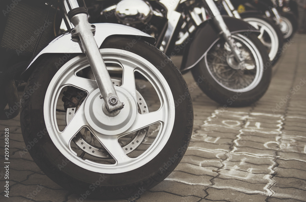 A sports bike is standing on the ground close up