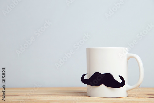 Fathers day concept with cup on grey background