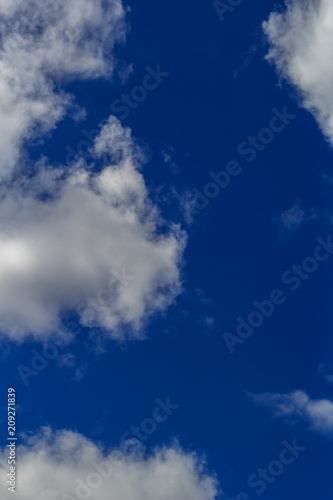 Blue sky and clouds with copy space © Olga Soloveva