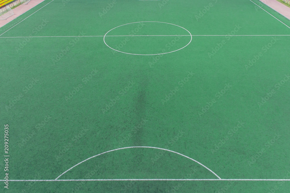 Fototapeta premium A soccer field with a bird's eye view. Stadium for the game.Part of the field