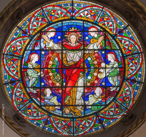 LONDON, GREAT BRITAIN - SEPTEMBER 14, 2017: The resurrected Jesus Christ among the angels on the stained glass in the church St. Michael Cornhill by Clayton and Bell from 19. cent. photo