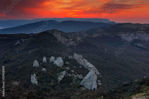 Dramatic landscape before sunrise in mountain. Rocks 'Sugar Heads' near the Laspi bay in the western part of the Crimean mountains. The rocks are also called 'Temple of the Sun'.
