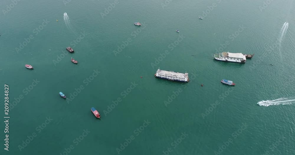 Aerial view of speed boats on the sea near beach city Aerial view of speed boats on the sea near beach city