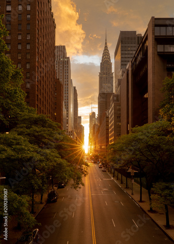 Manhattanhenge when the sun sets along 42nd street in NY photo