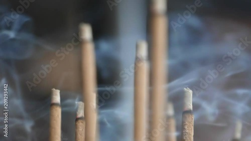 slow motion close up of incense smoke at kinkakuji temple in kyoto, japan- originally recorded at 180p
