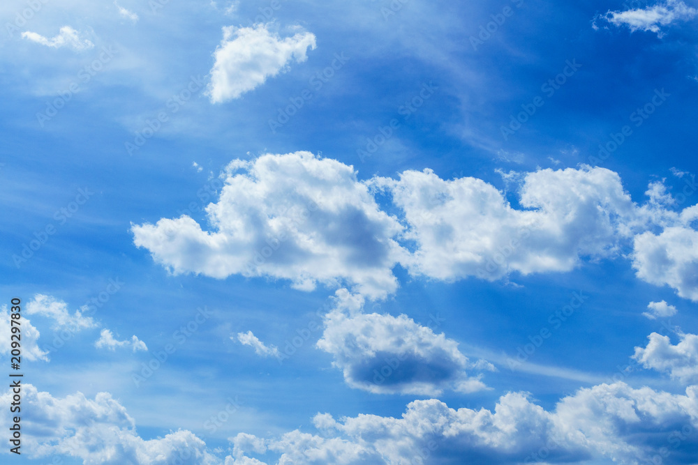 Blue, fluffy clouds in the sky. Background of nature, stratosphere. Blue, fluffy clouds in the sky. Background of nature, stratosphere.