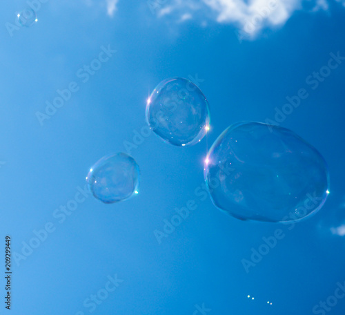 Soap bubbles and blue skies