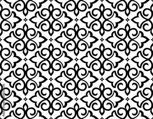 Wallpaper in the style of Baroque. A seamless vector background. White and black floral ornament. Graphic pattern for fabric, wallpaper, packaging. Ornate Damask flower ornament