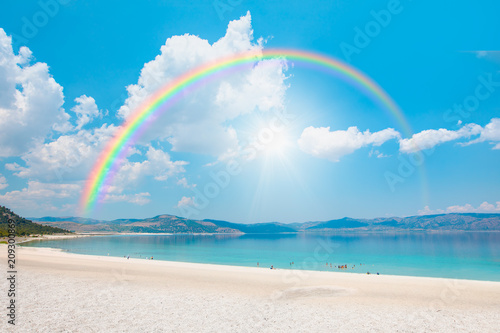 Holidaymakers sunbathing at...