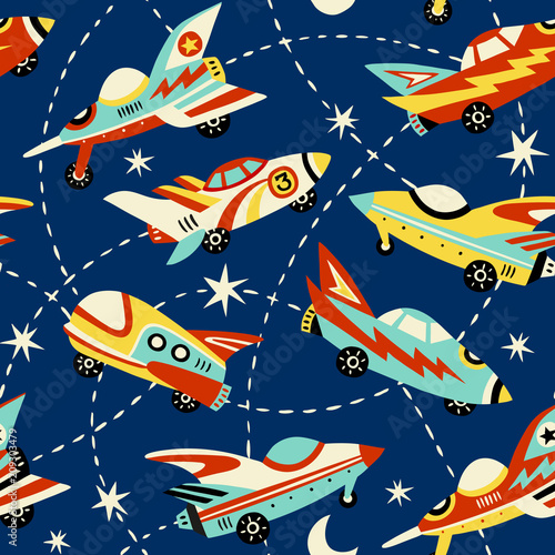 Vintage space cars seamless vector pattern on dark blue background. Cute hand drawn cars, rockets, stars and moon. Perfect for fabric, wallpaper or wrapping paper. 