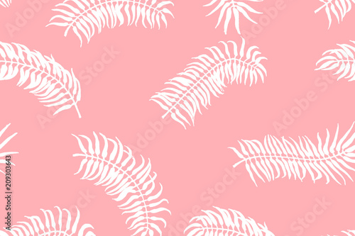 Tropical pattern. Palm leaves on the pink background