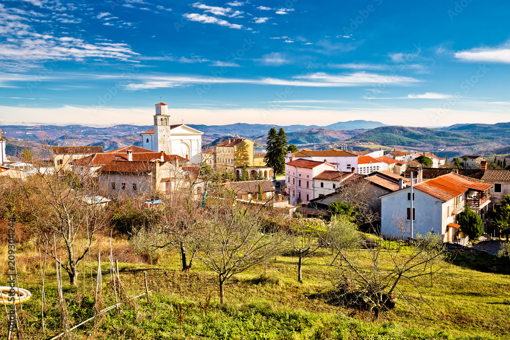 Town of Vizinada church and skyline above istrian landscape view