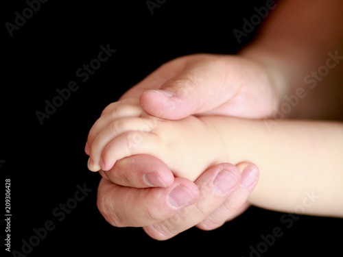 father and son, hand in hand