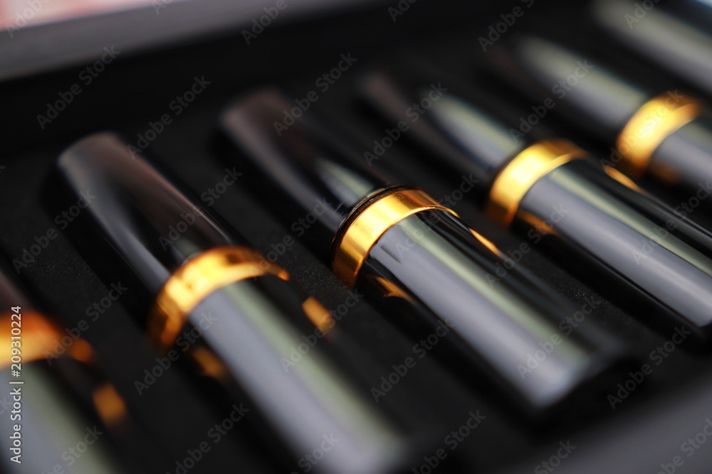 Set of lipsticks for make up, top view, closeup, abstract, texture, as background Set of lipsticks for make up, top view, closeup, abstract, texture, as background