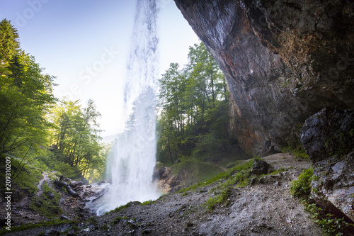 giant big waterfall called Wildensteiner waterfall in austria photo