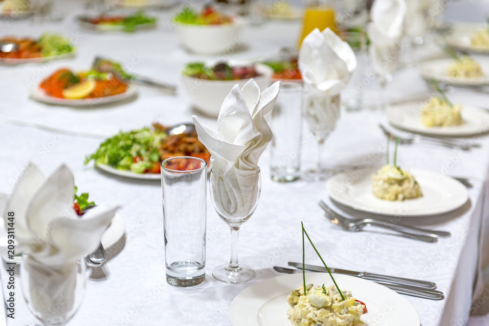 served holiday table, plates with dishes, salads, glasses, napkins, cutlery, tableware served holiday table, plates with dishes, salads, glasses, napkins, cutlery, tableware