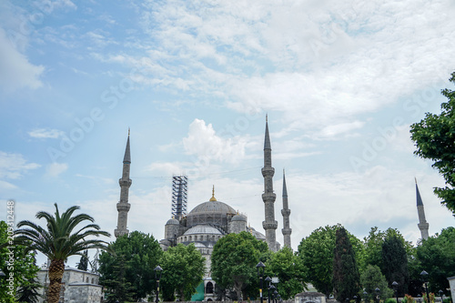 The blue mosque architectural landscape view showing heritage building restoration on blue sky background, Istanbul