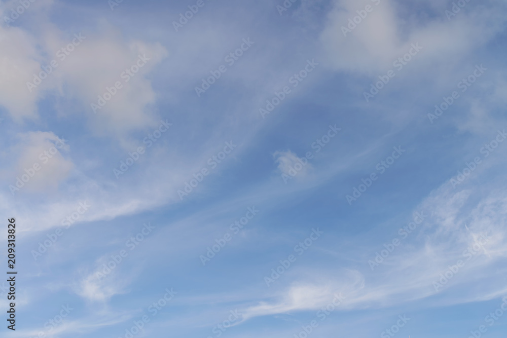Fototapeta premium Blue sky background with clouds.