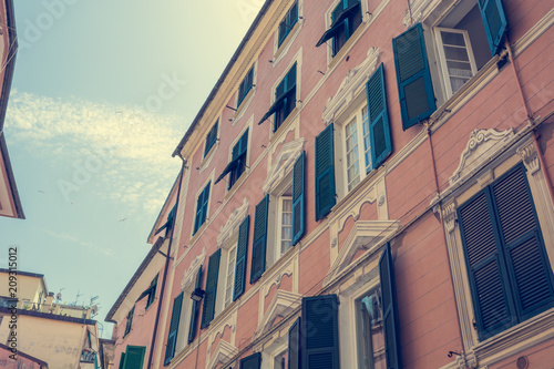 Wallpaper Mural Old building with red facade and green windows. Torontodigital.ca