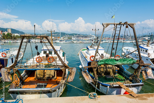 Busy sea port with ships and boats docked in. © anzebizjan