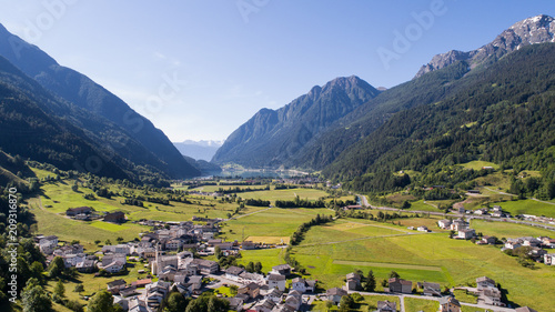 Holidays in Val Poschiavo, little alpine village and lake of Poschiavo. Switzerland.