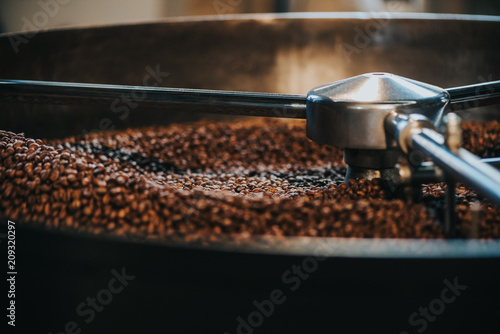 Fototapeta Coffee roaster cylinder roasting and mixing coffee beans