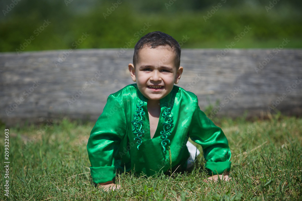 Little boy child dressed in the clothing culture of India. Little boy child dressed in the clothing culture of India.