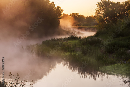 beautiful misty early morning on the river.   © Ann Stryzhekin