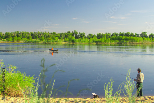 fisherman on the river photo