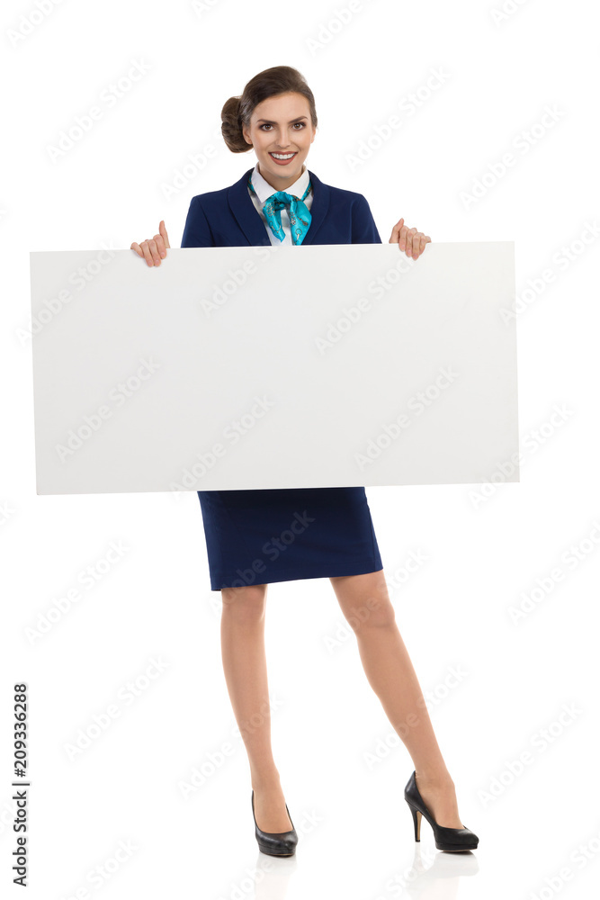 Smiling Stewardess Is Presenting Blank Poster