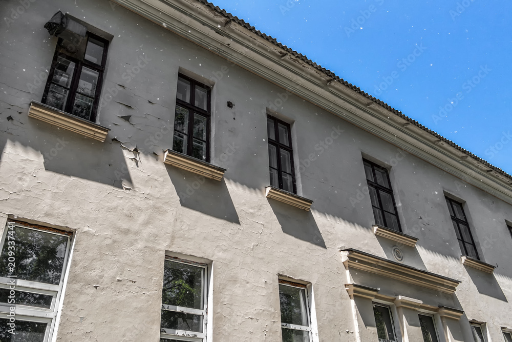 Old abandoned hospital. Medical complex. Old architecture. Architectural heritage. Poplar fluff