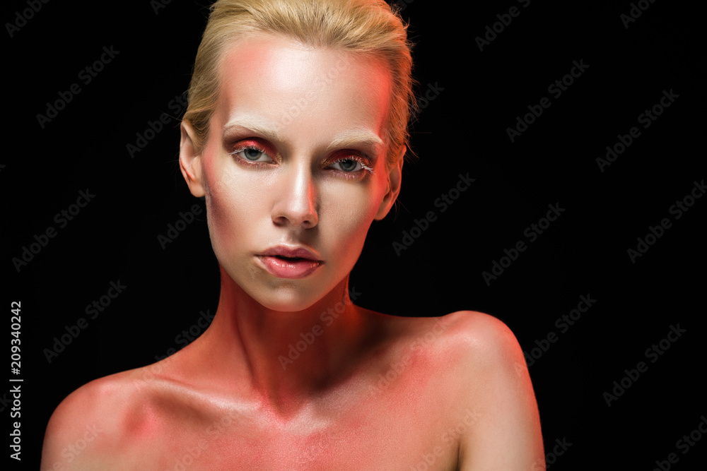 attractive woman with makeup for fashion shoot, isolated on black attractive woman with makeup for fashion shoot, isolated on black