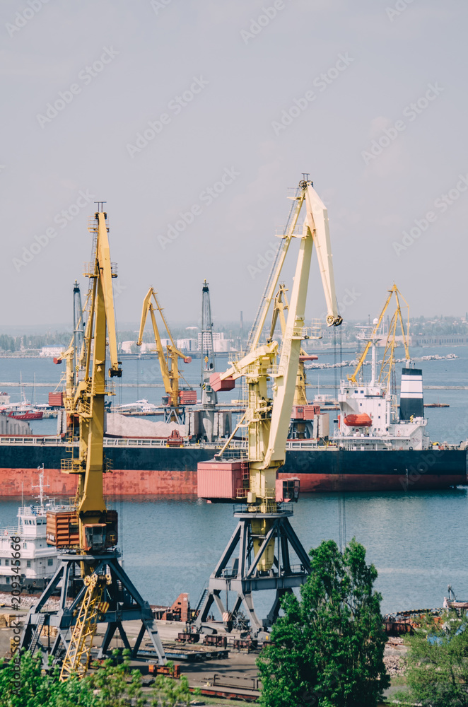 Commercial Port of Ilyichevsk. The loading of a cargo ship at dock in Odessa seaport.