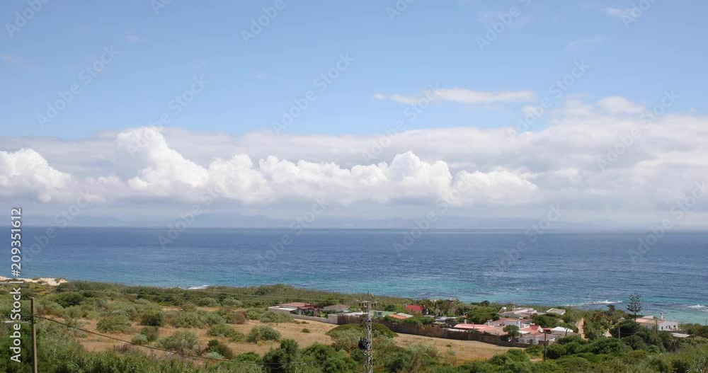 landscape cloudy sky of Strait of Gibraltar, ocean and Morocco coast in the horizon, Africa, from Cadiz, Spain, Europe
landscape cloudy sky of Strait of Gibraltar, ocean and Morocco coast in the horizon, Africa, from Cadiz, Spain, Europe