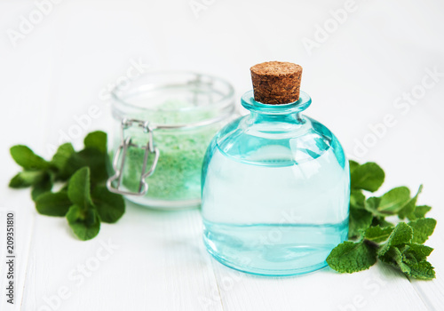 essential aroma oil with massage salt and mint