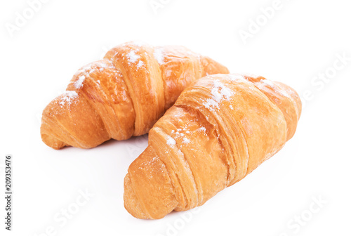 Two croissants on a white background.