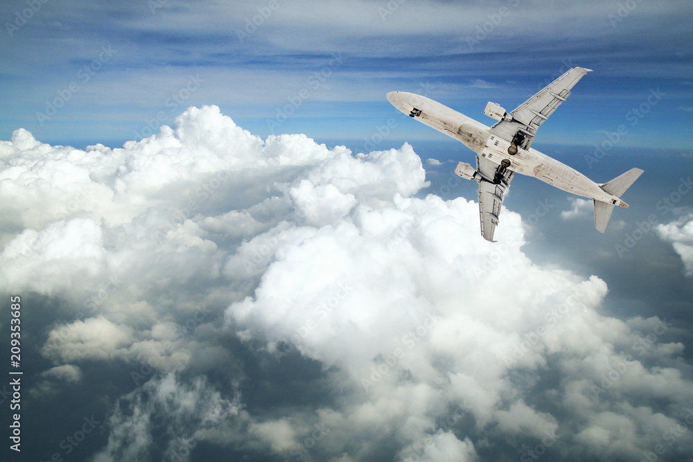 Obraz premium Airplane in the sky. Copy space of business summer vacation and travel adventure concept. Airplane sky and sunshine 