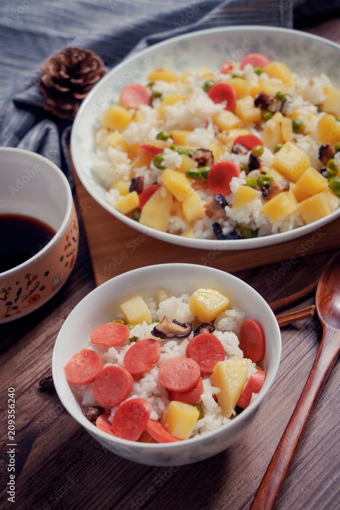 Wooden background and cooked rice Wooden background and cooked rice