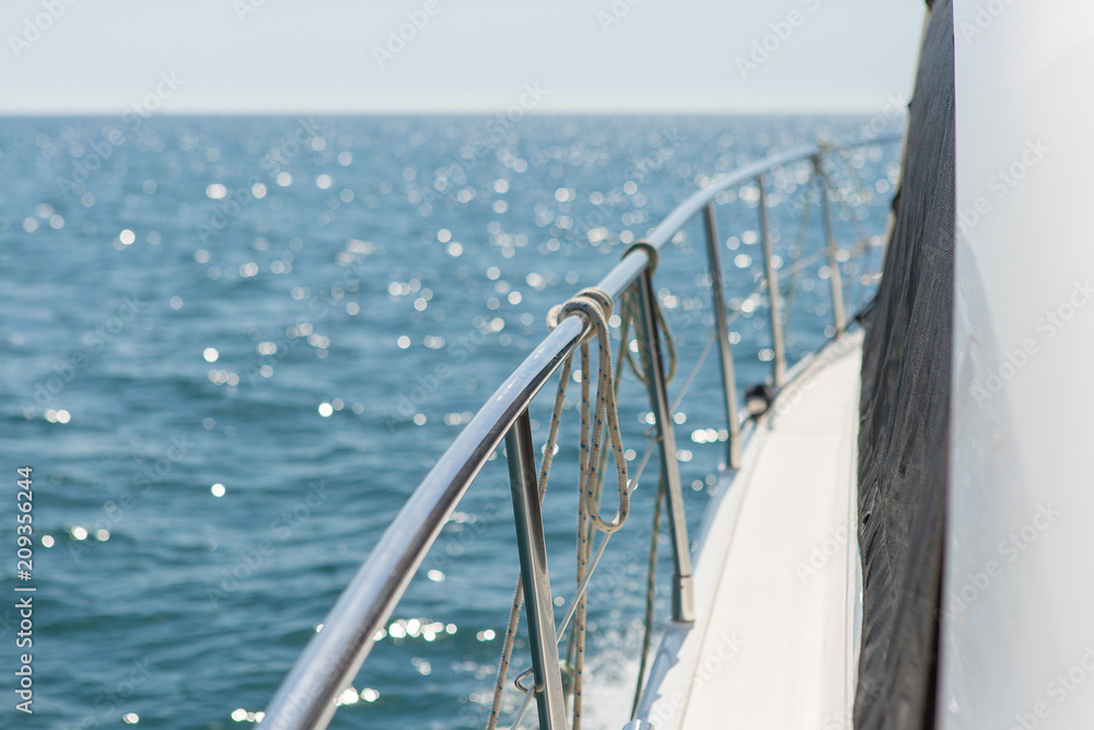 Sea waves splashing, yacht track Sea waves splashing, yacht track