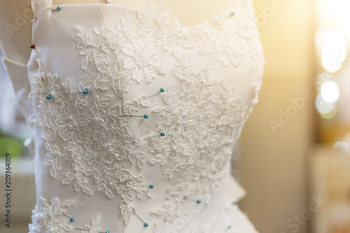 beautiful wedding dress decorated with flower patterns