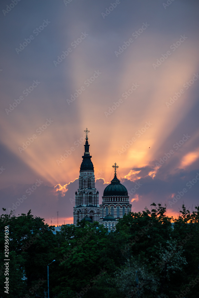 Christian church in evening dawn sun lights summer halo sign religious 