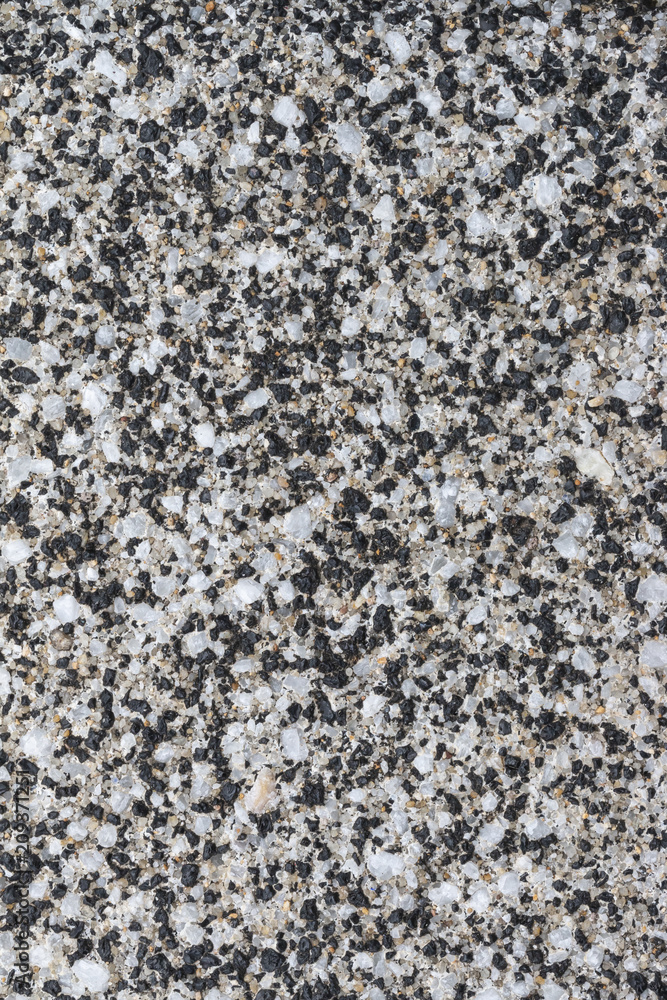 Obraz premium 砂利の混ざったコンクリートの地面